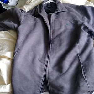 Nike Jordan 85-20-05 jacket.  100 percent polyester/velour. Fits like a L-XL.